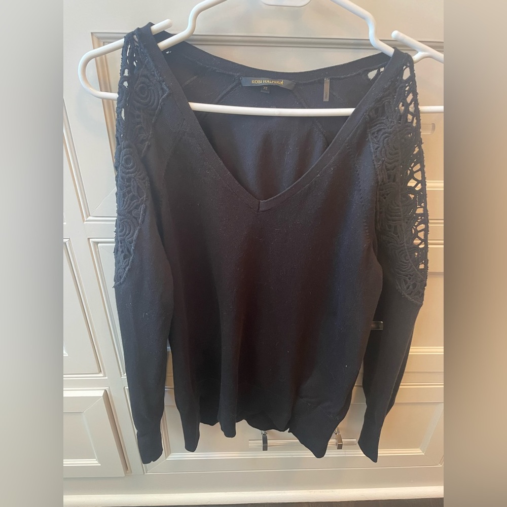 Black sweater with cut outs and lace